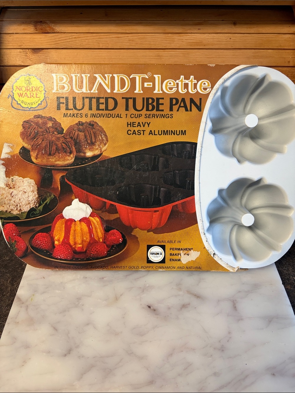 Nordic Ware Bundt-lette Fluted Tube Pan Set in White and Gold Packaging